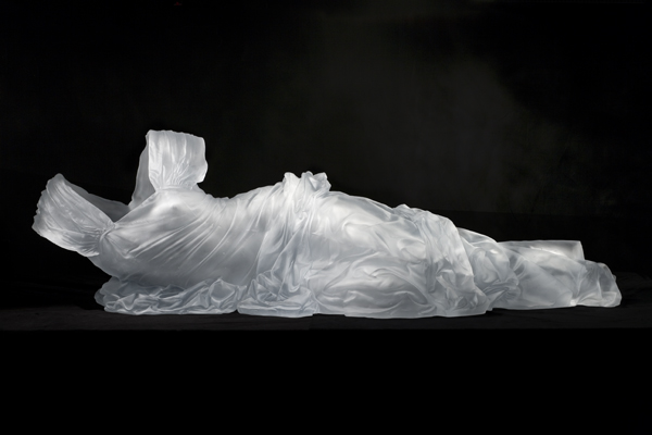 Karen LaMonte "Reclining Dress Impression with Drapery" Cast glass, life size, 2007. Collection of the Renwick Gallery of the Smithsonian American Art Museum.