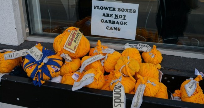 Gourd bombing by participants in Frau Fiber’s pre-conference workshop - on the streets of Gatlinburg, TN, Thursday, October 8, 2015. Photo by Tamryn McDermott McDermott_MadeAware_Frau Fiber yarn bomb_1